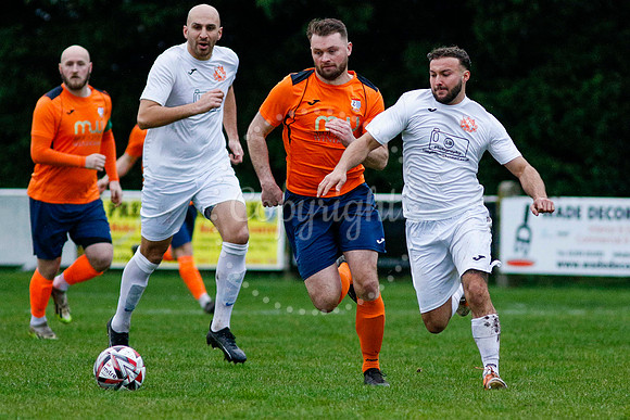 Football action from Diss Town vs Holland FC