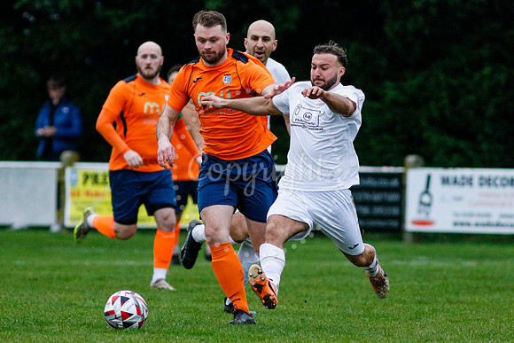 Football action from Diss Town vs Holland FC