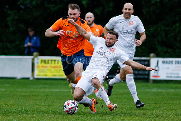 Football action from Diss Town vs Holland FC