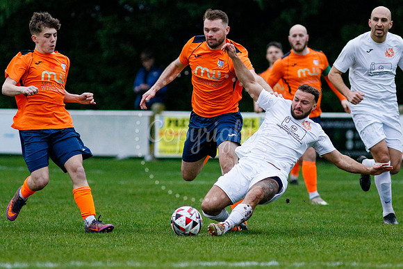 Football action from Diss Town vs Holland FC