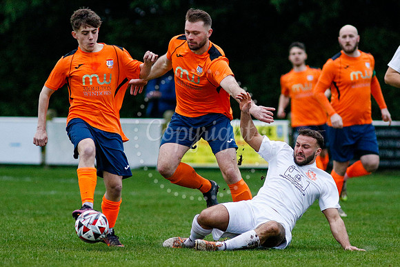 Football action from Diss Town vs Holland FC