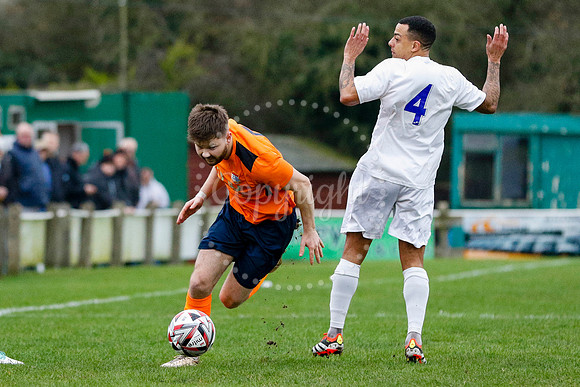 Football action from Diss Town vs Holland FC