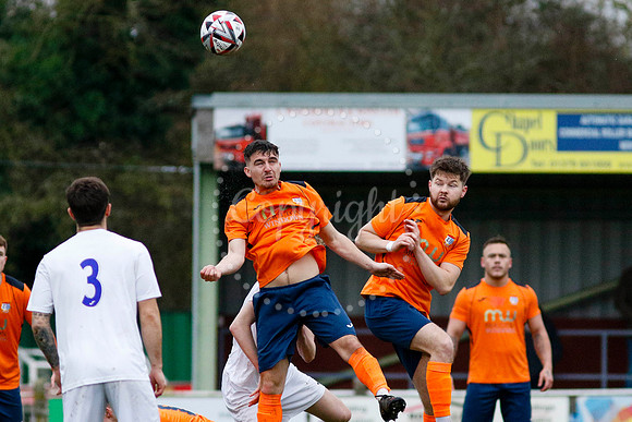 Football action from Diss Town vs Holland FC