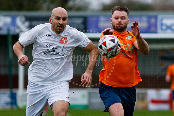 Football action from Diss Town vs Holland FC
