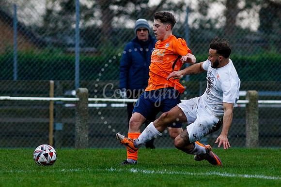 Football action from Diss Town vs Holland FC