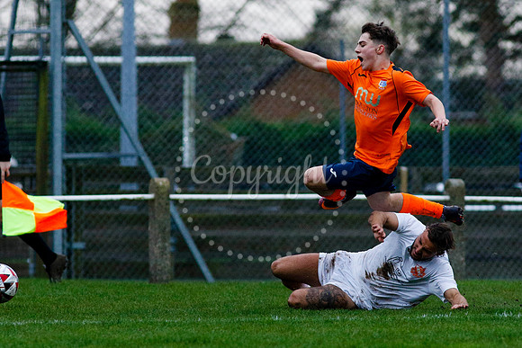 Football action from Diss Town vs Holland FC