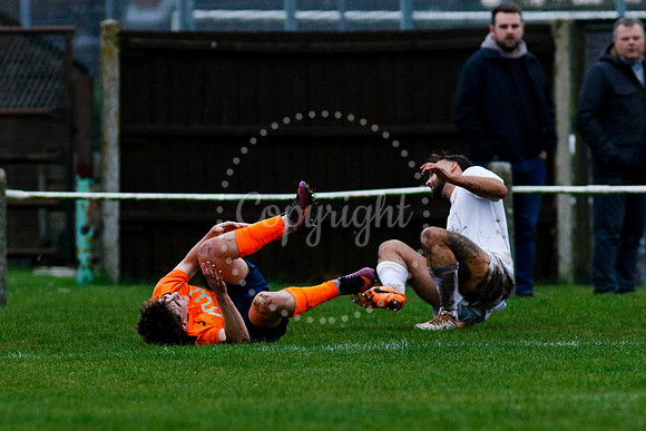 Football action from Diss Town vs Holland FC