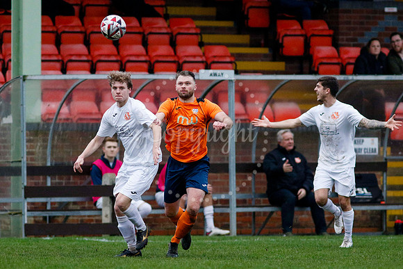 Football action from Diss Town vs Holland FC