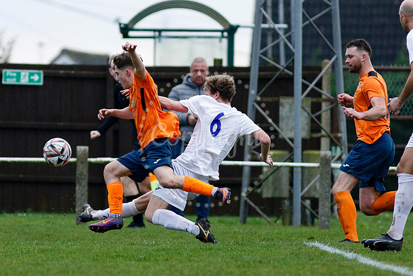 Football action from Diss Town vs Holland FC
