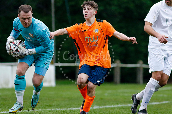 Football action from Diss Town vs Holland FC