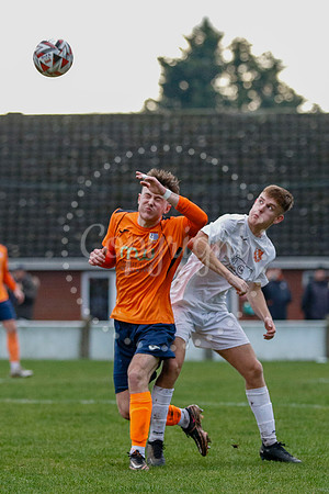 Football action from Diss Town vs Holland FC