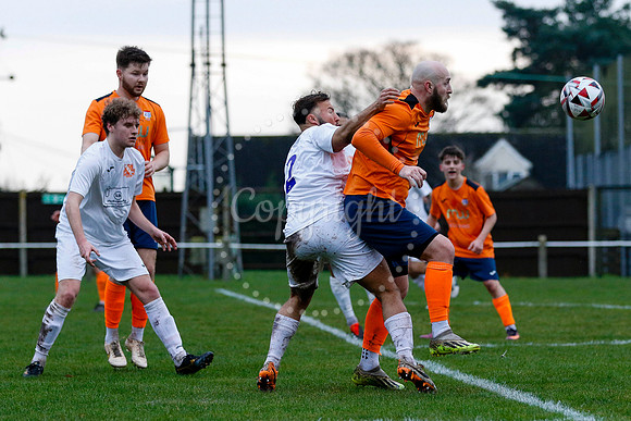 Football action from Diss Town vs Holland FC