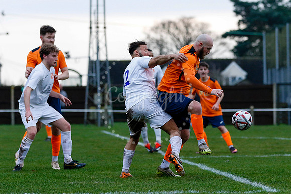 Football action from Diss Town vs Holland FC