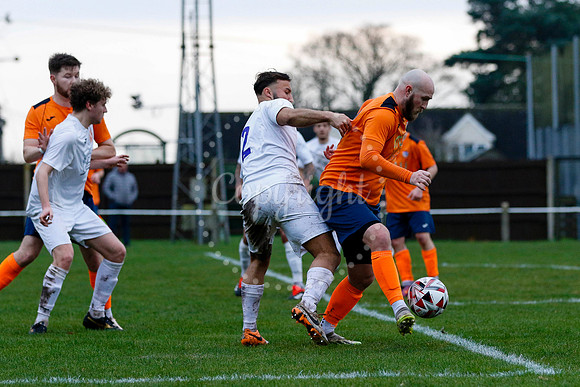 Football action from Diss Town vs Holland FC