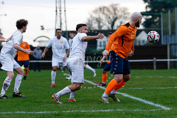 Football action from Diss Town vs Holland FC
