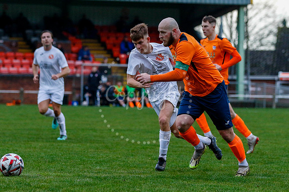 Football action from Diss Town vs Holland FC