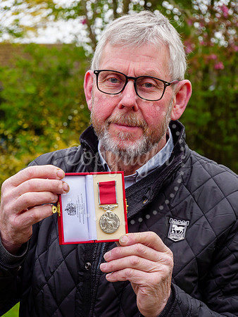 Framlingham shop owner Bill Bulstrode has been awarded a BEM med