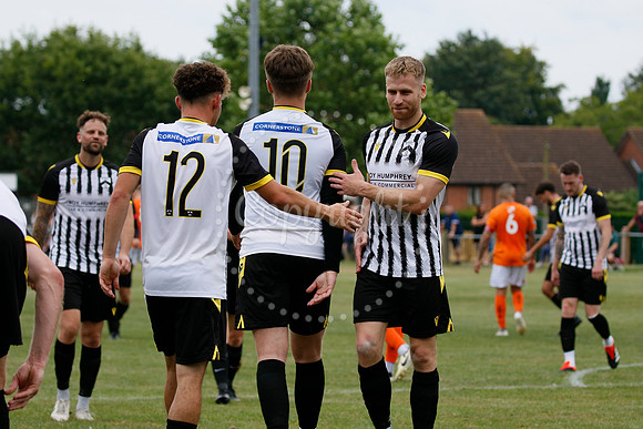 Football action from Harleston Town vs Heacham
