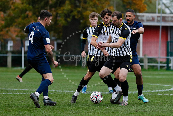 Football action from Harleston vs Bramtham Athletic