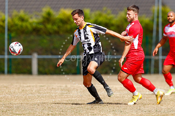 Football action from Harleston v Woodbridge
