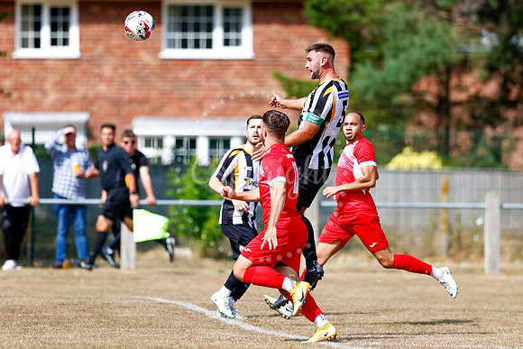 Football action from Harleston v Woodbridge