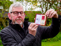 Framlingham shop owner Bill Bulstrode has been awarded a BEM med