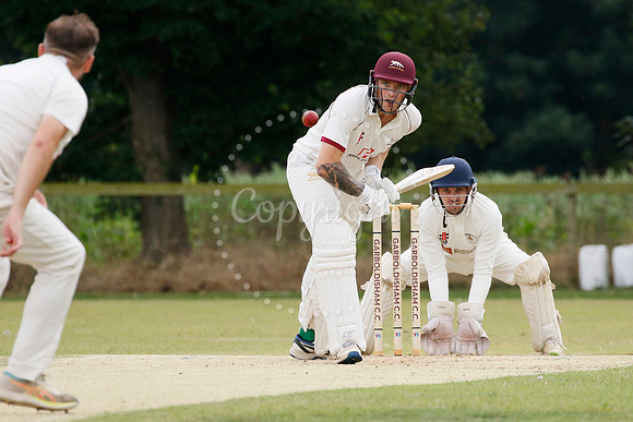 Cricket action from Garboldisham vs Bradfield
