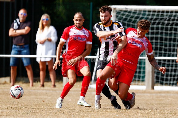 Football action from Harleston v Woodbridge