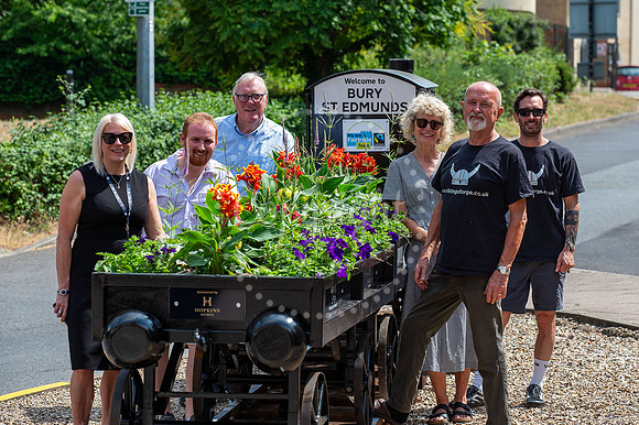 BFP Outside Bury St Edmunds train stationMini train with flowers by Bury in Bloom outside the train station, picture of it with members of Bury in Bloom. Picture by Mark Westley