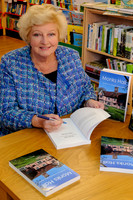 Baronness Elaine Murphy signing her book in Diss Publishing.