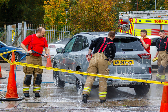 Staff from across Norfolk Fire & Rescue Service take part in a f