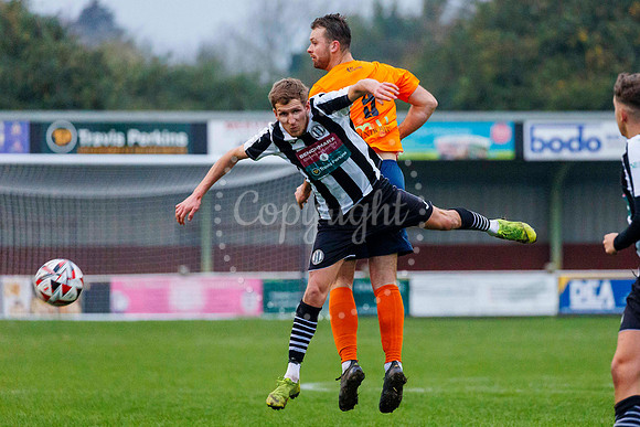 Football action from Diss Town Swaffham Town
