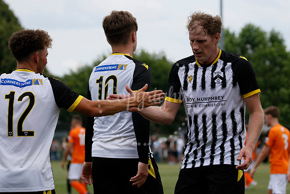 Football action from Harleston Town vs Heacham