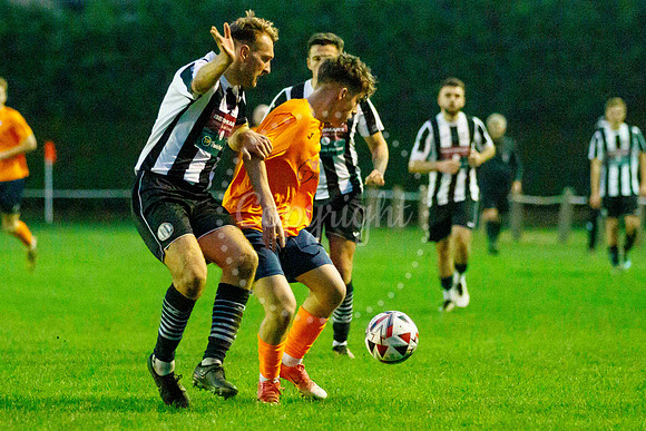 Football action from Diss Town Swaffham Town