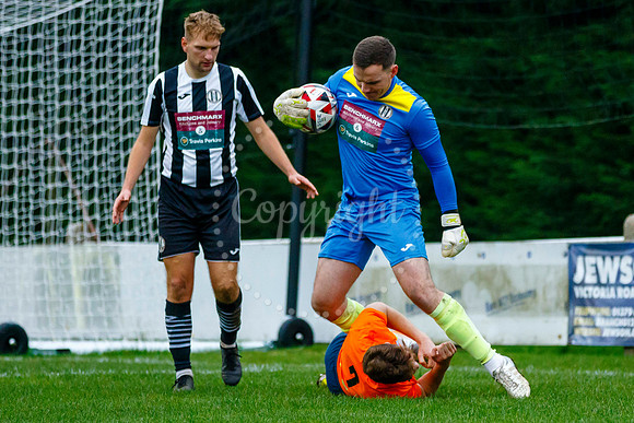 Football action from Diss Town Swaffham Town