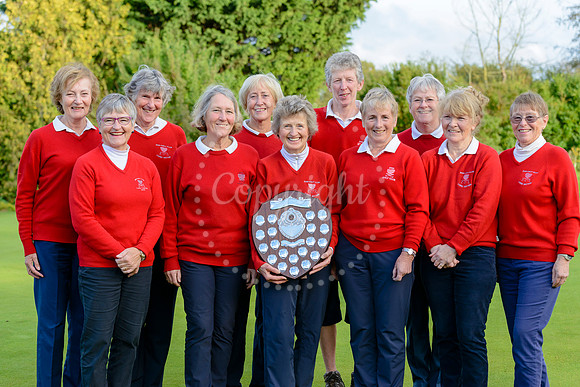 Diss Ladies Golfers celebrate the success for the year with their trophies.