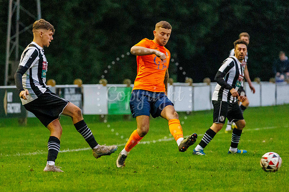 Football action from Diss Town Swaffham Town