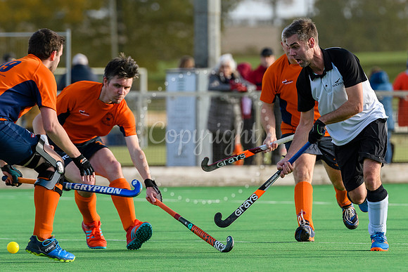 Hockey action from Harleston Magpies Men's 4 v Bury St Edmunds 3