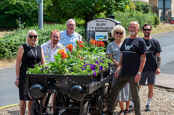 BFP Outside Bury St Edmunds train stationMini train with flowers by Bury in Bloom outside the train station, picture of it with members of Bury in Bloom. Picture by Mark Westley