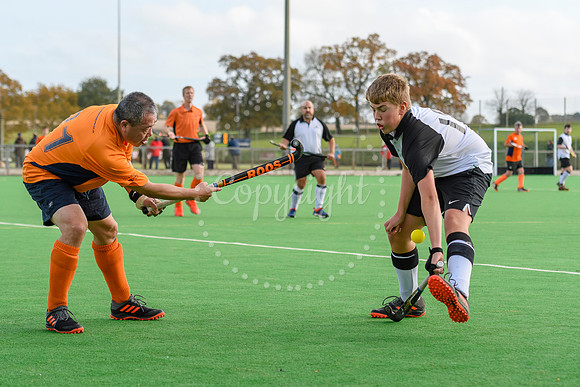 Hockey action from Harleston Magpies Men's 4 v Bury St Edmunds 3
