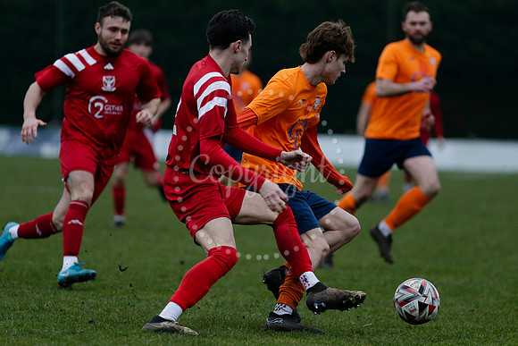 Football action from Diss Town FC vs Parson Drove