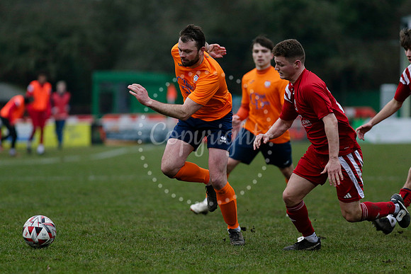 Football action from Diss Town FC vs Parson Drove