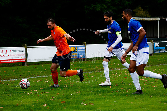 Football action from Diss Town vs FC Peterborough