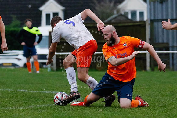 Football action from Diss Town hosting Holland FC.