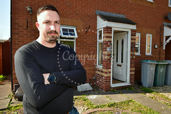 Carl Forster with his water damaged house