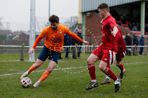 Football action from Diss Town FC vs Parson Drove