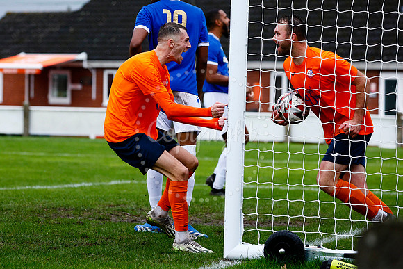 Football action from Diss Town vs FC Peterborough