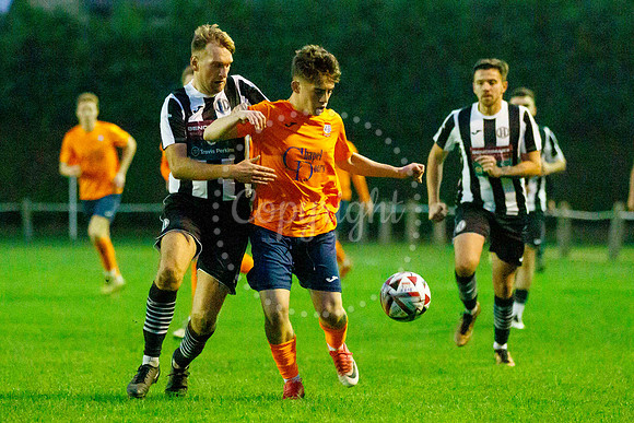Football action from Diss Town Swaffham Town