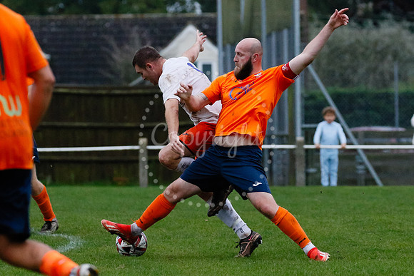 Football action from Diss Town hosting Holland FC.
