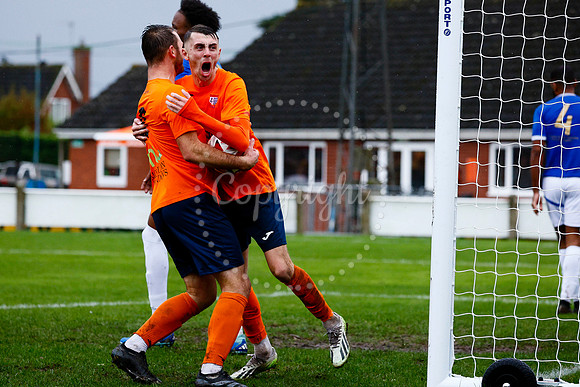 Football action from Diss Town vs FC Peterborough